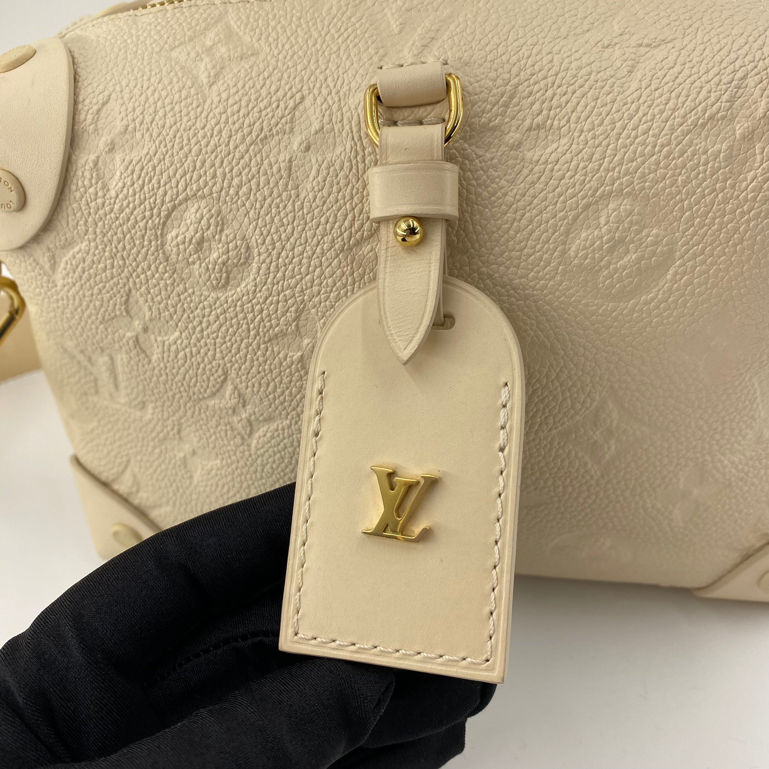 LV PETITE MALLE SOUPLE IN WHITE