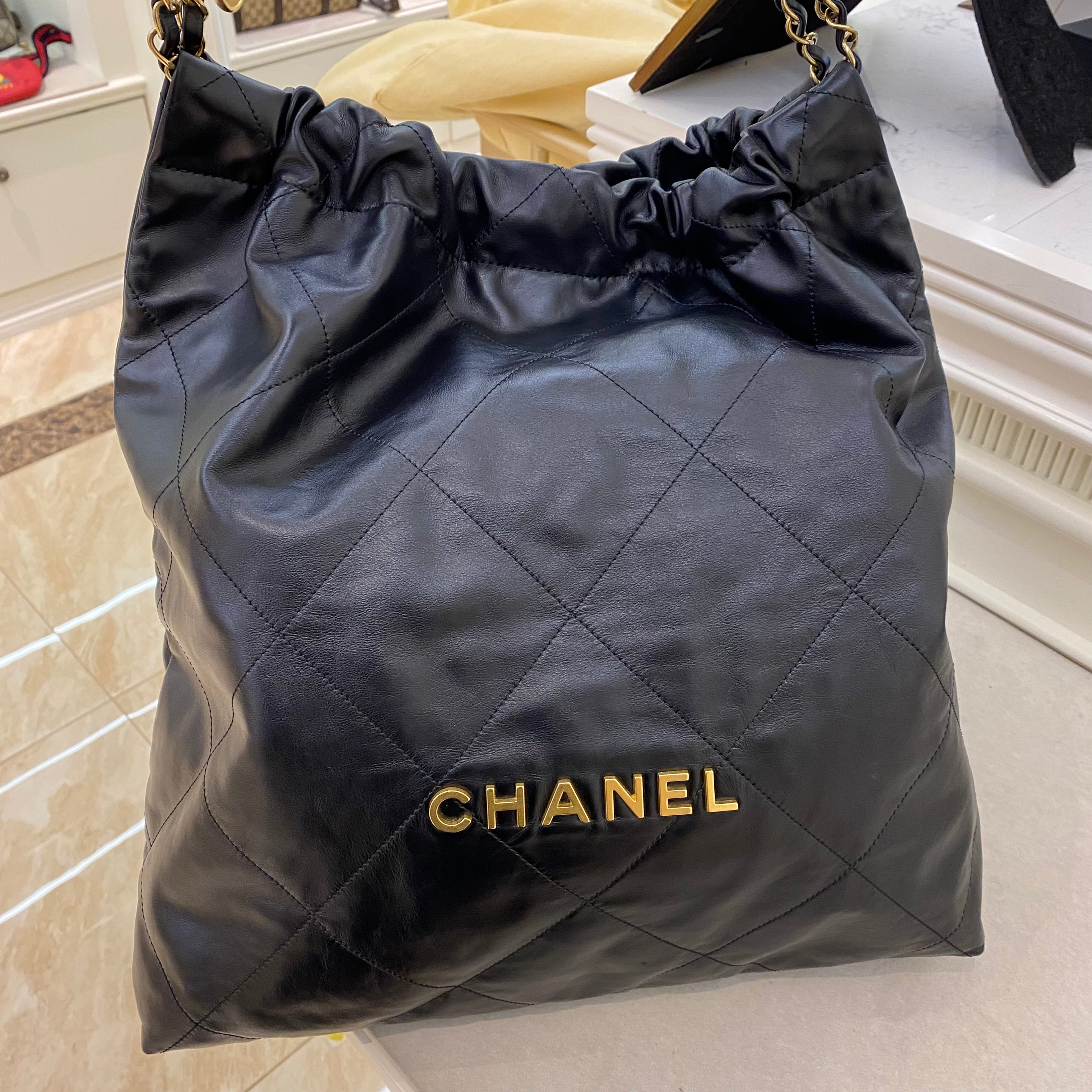 Chanel 22 Large Handbag Shiny Calfskin Gold Tone Metal Black