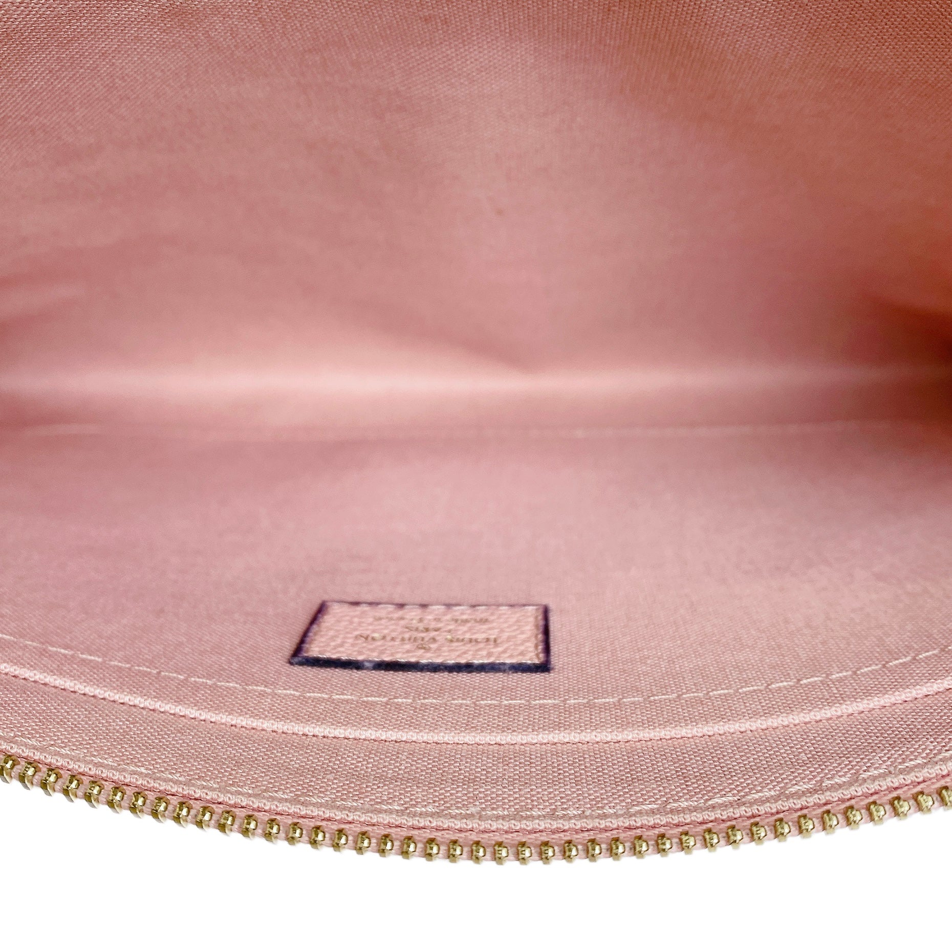 LV EMPREINTE POUCH IN PINK