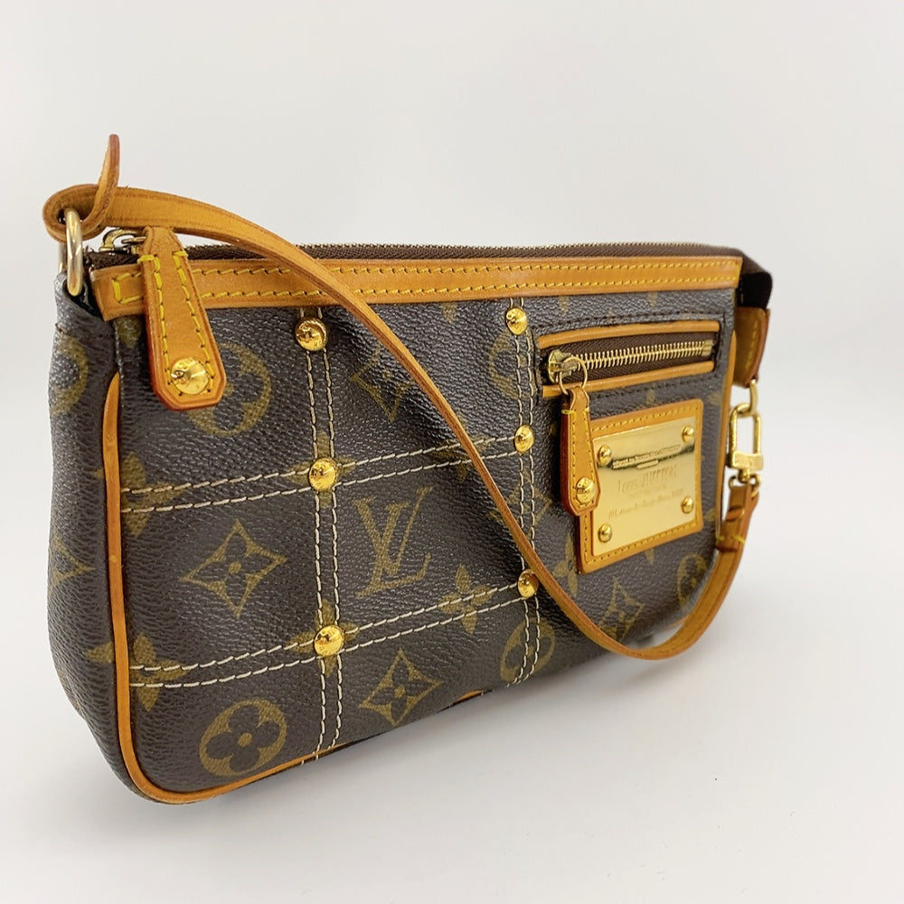 Louis Vuitton Limited Edition Riveting Pochette Accessoires