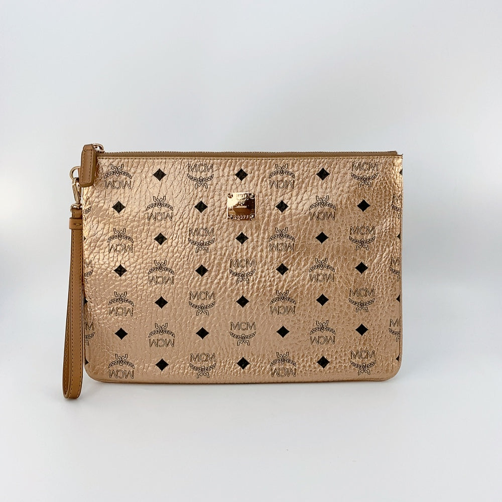 MCM CLUTCH IN CHAMPAGNE GOLD