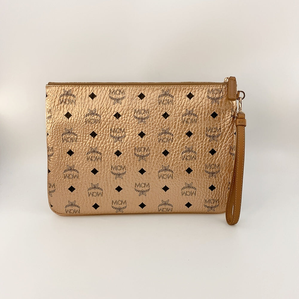 MCM CLUTCH IN CHAMPAGNE GOLD