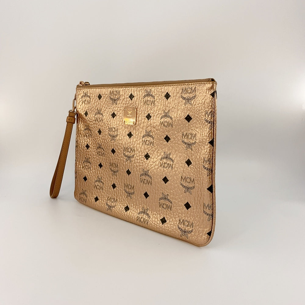 MCM CLUTCH IN CHAMPAGNE GOLD