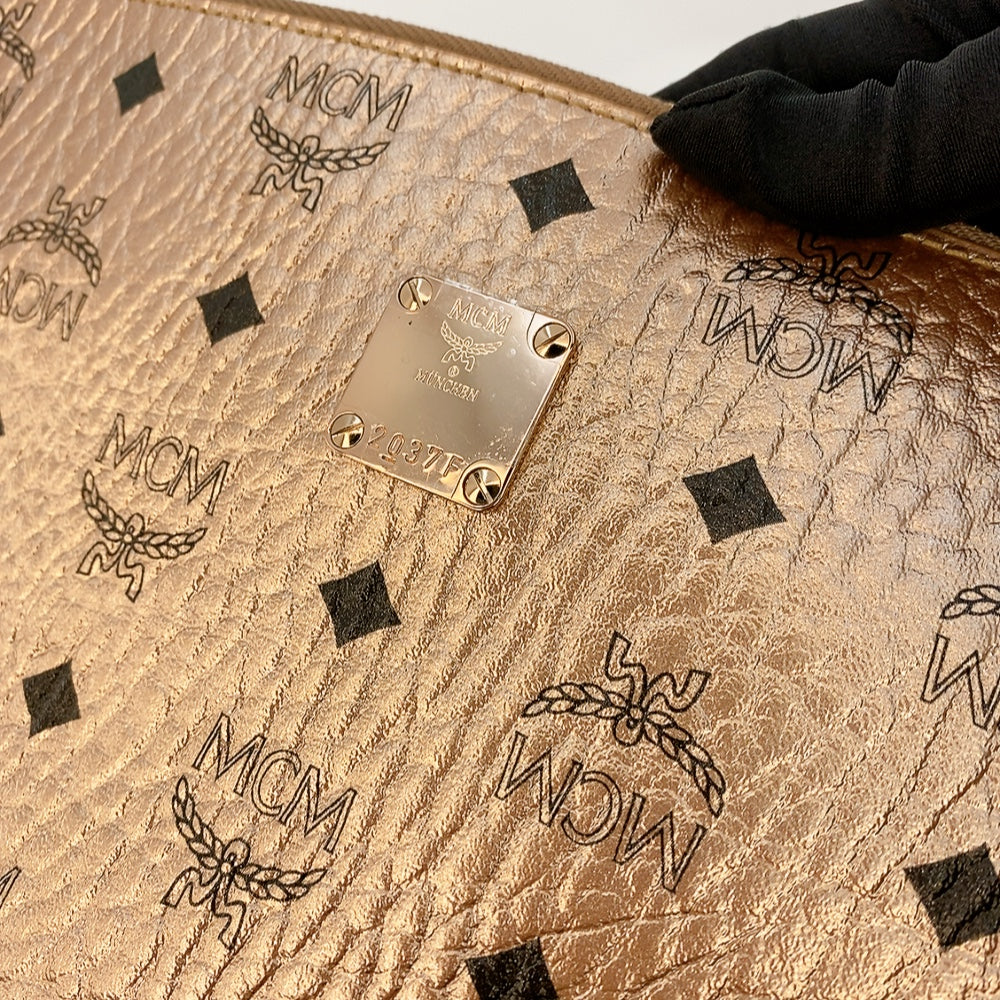 Mcm champagne gold best sale