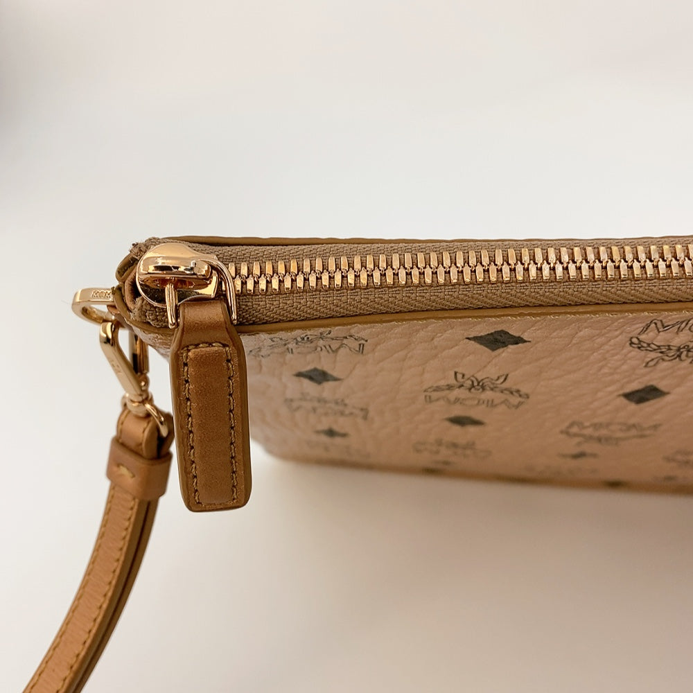 MCM CLUTCH IN CHAMPAGNE GOLD