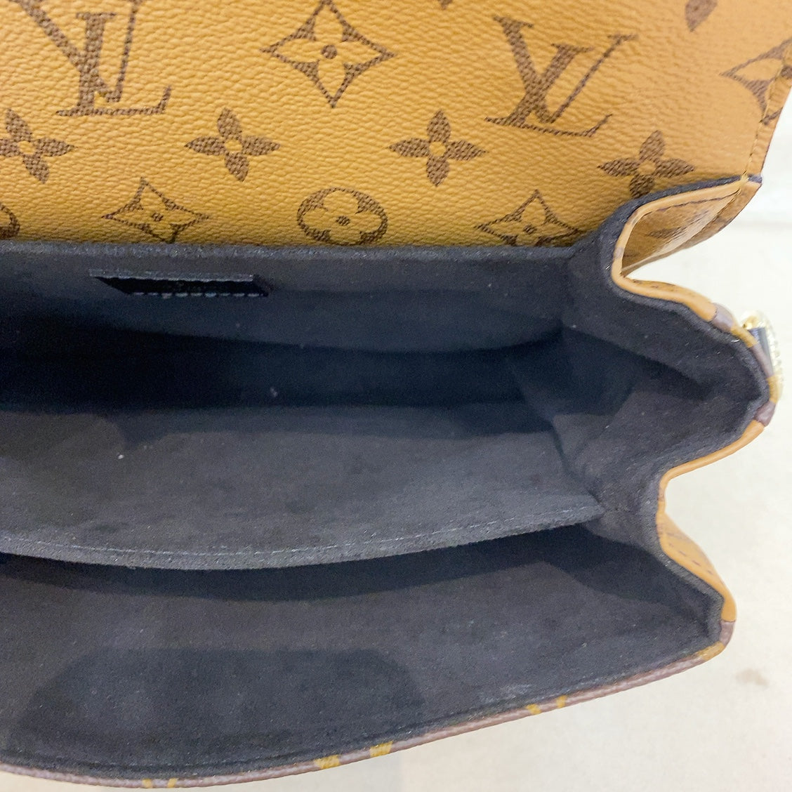 Lv reverse pochette discount metis