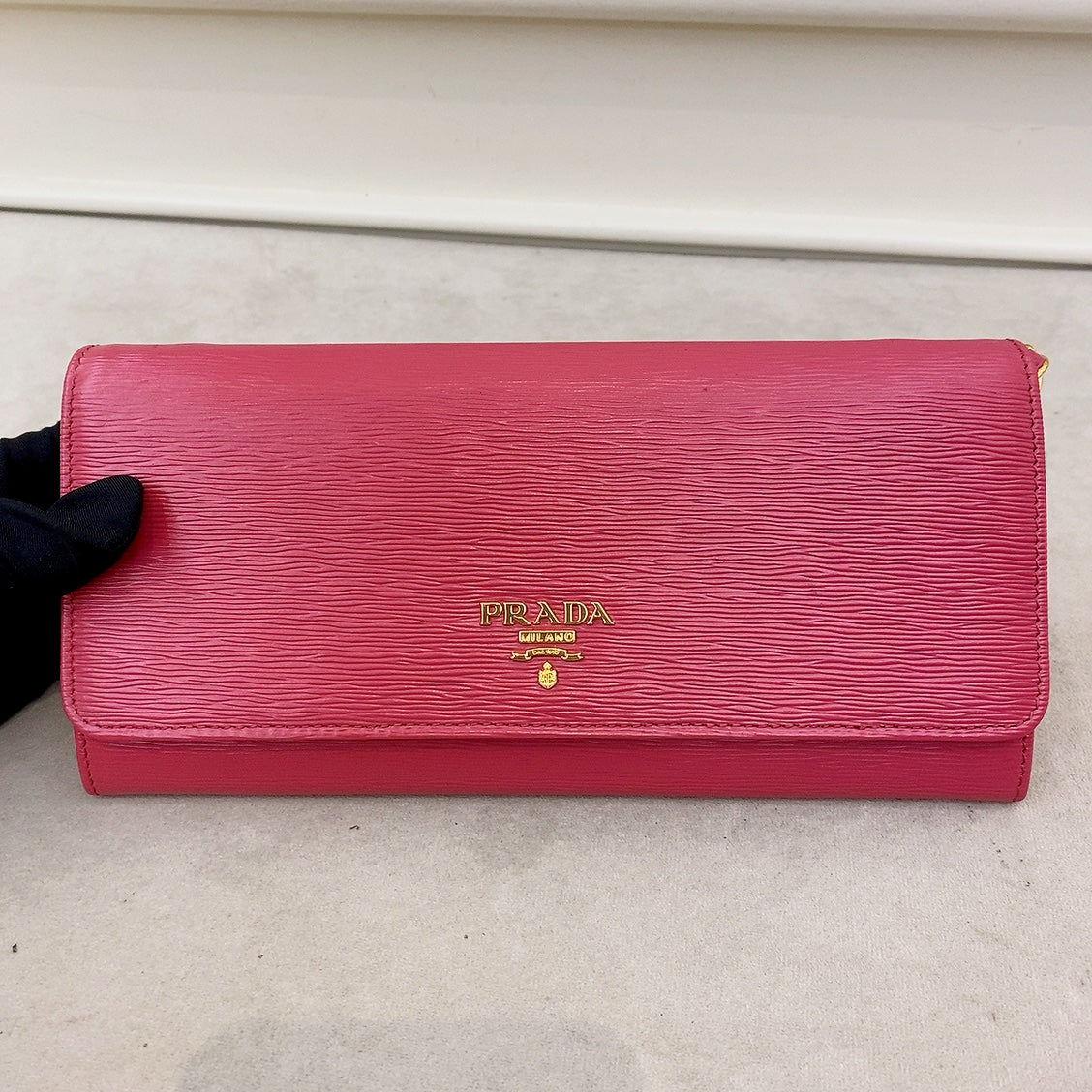 prada saffiano pink leather flap wallet