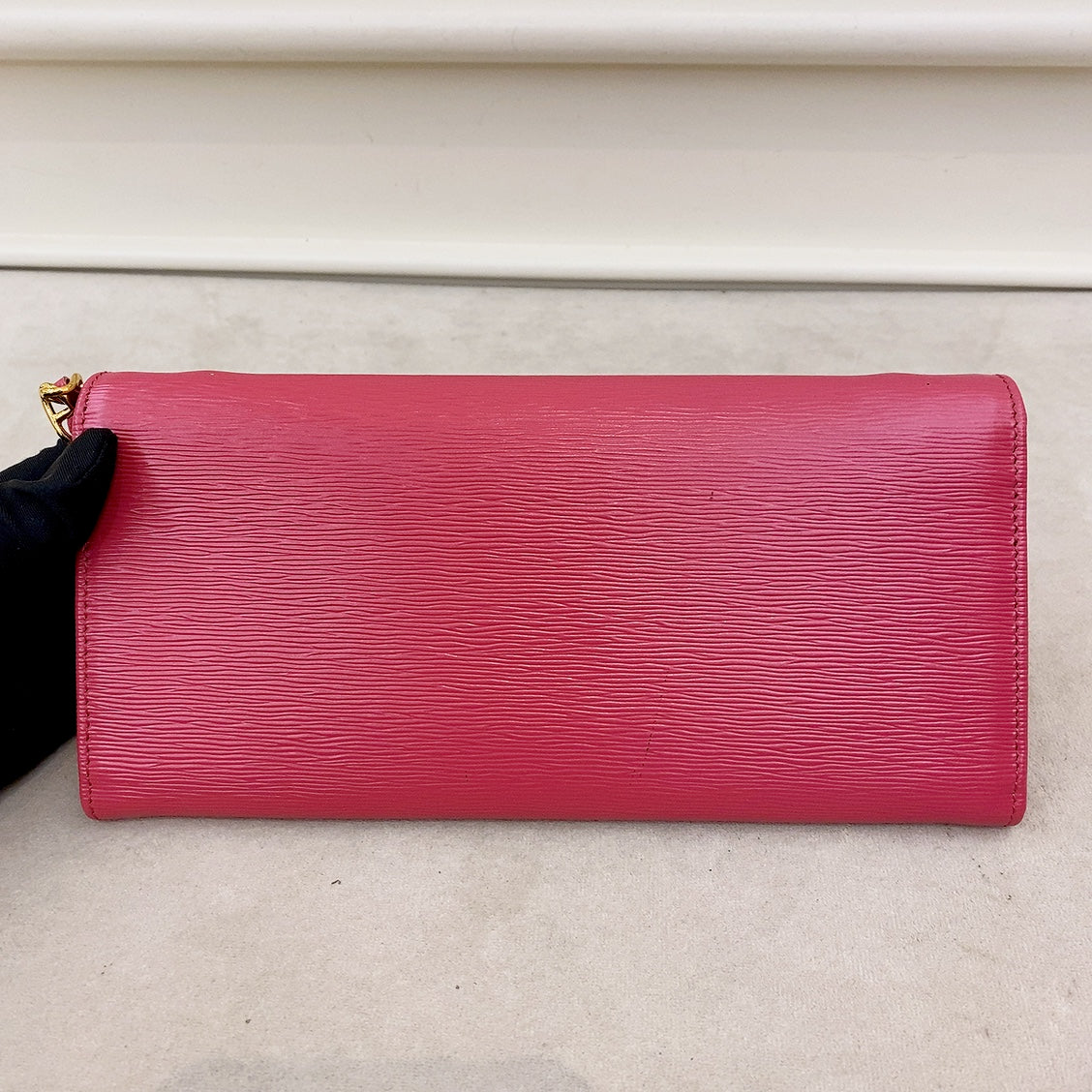 prada saffiano pink leather flap wallet