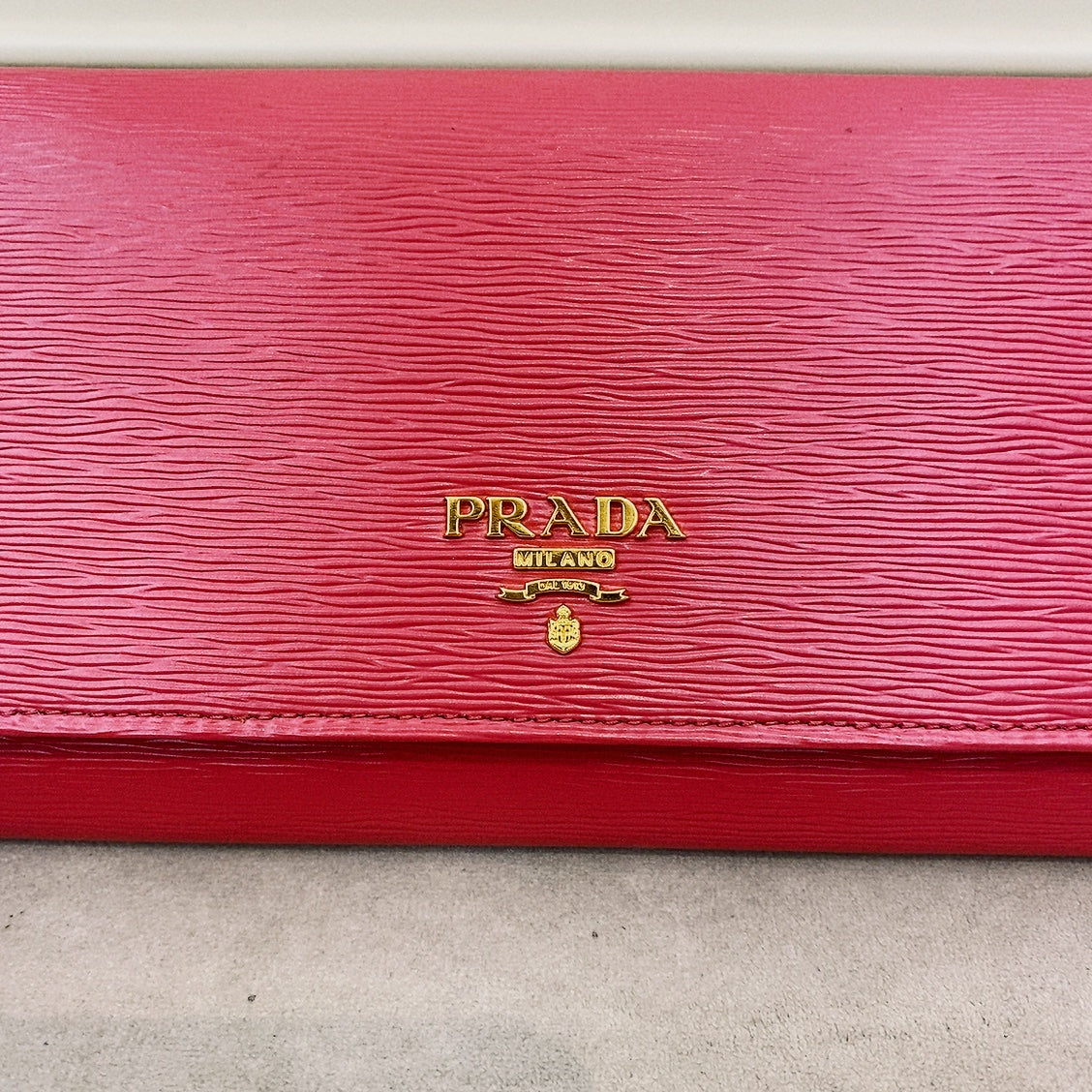 prada saffiano pink leather flap wallet