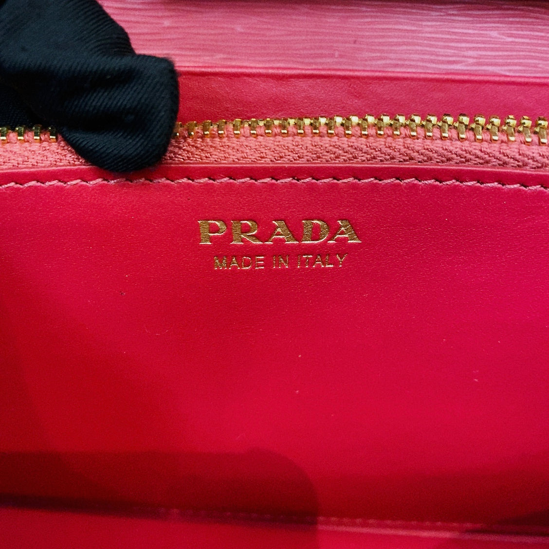 prada saffiano pink leather flap wallet