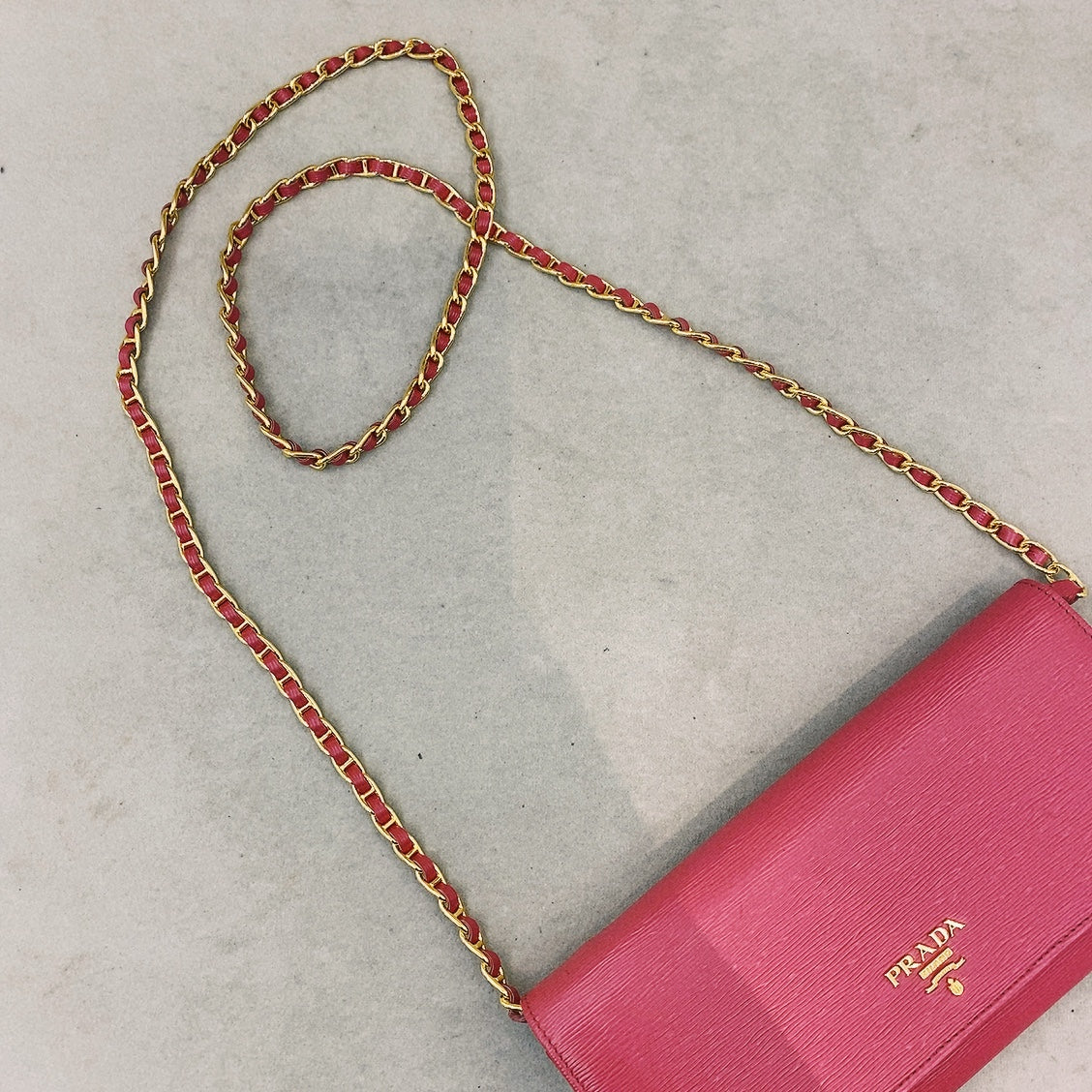 prada saffiano pink leather flap wallet