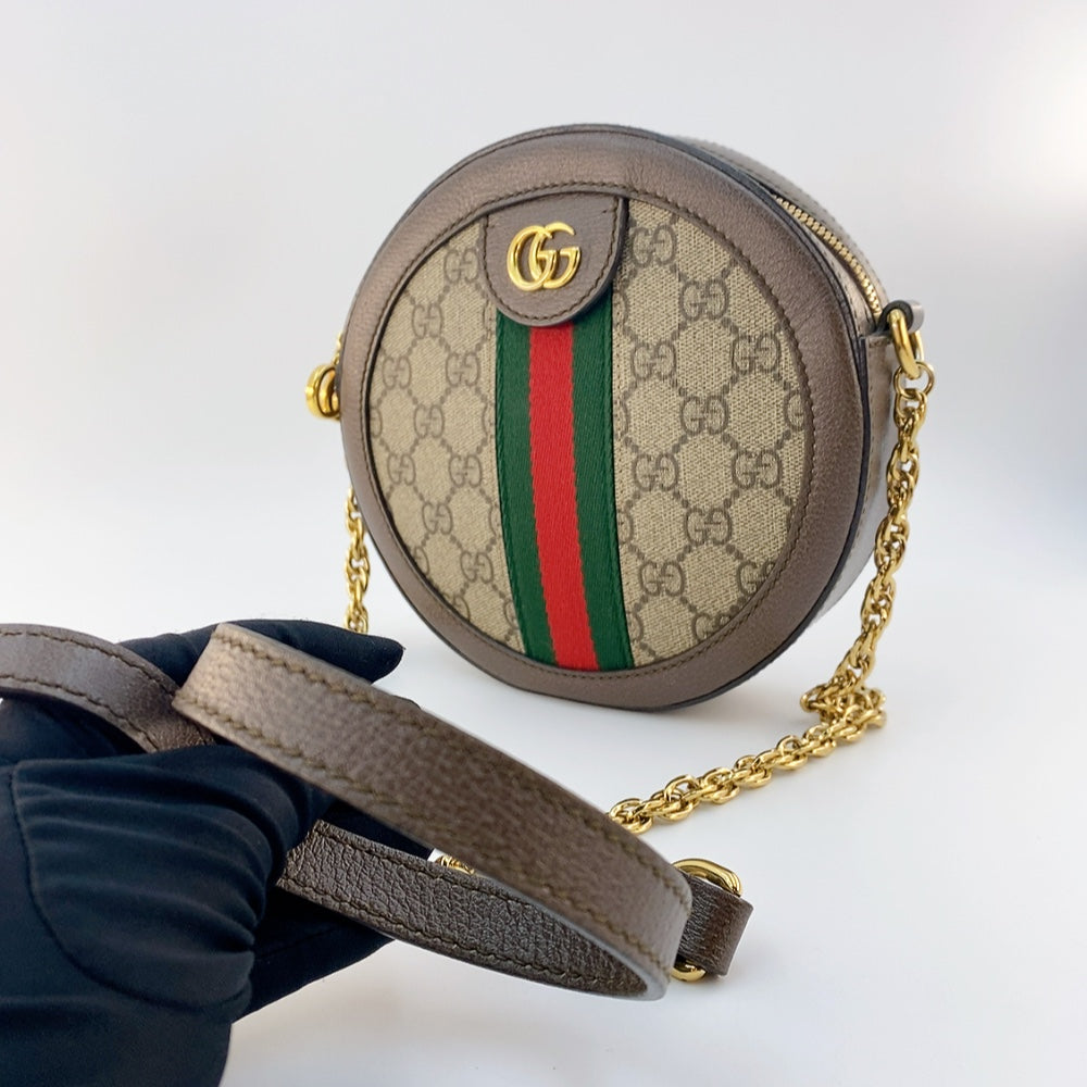 GUCCI ROUND SLING BAG