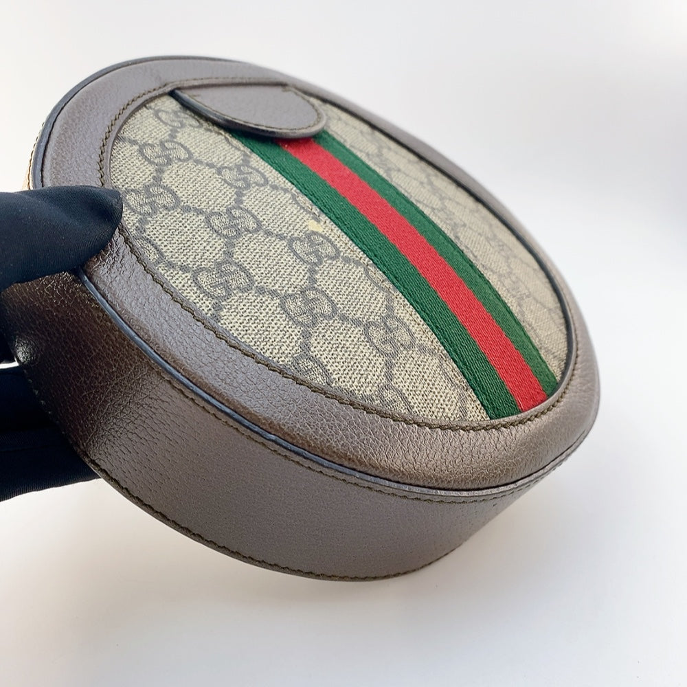 GUCCI ROUND SLING BAG