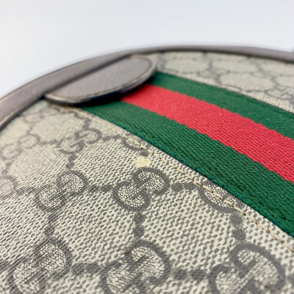 GUCCI ROUND SLING BAG