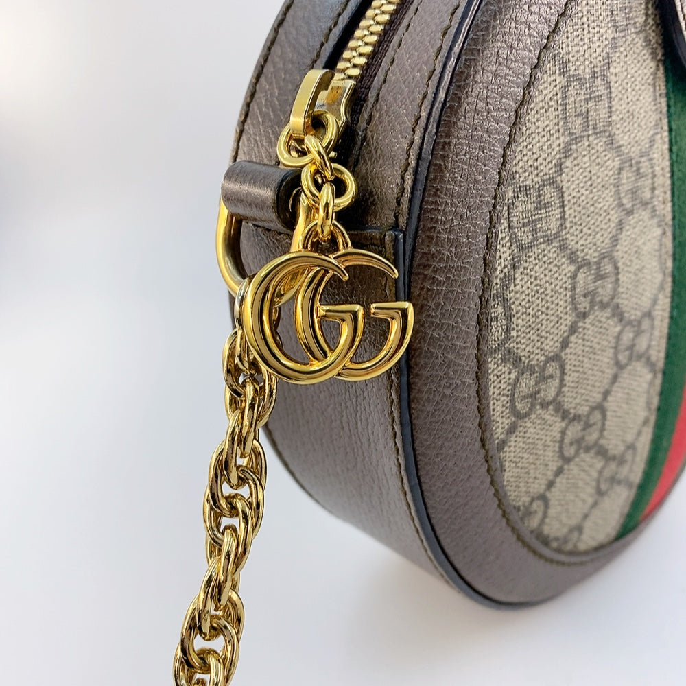 GUCCI ROUND SLING BAG