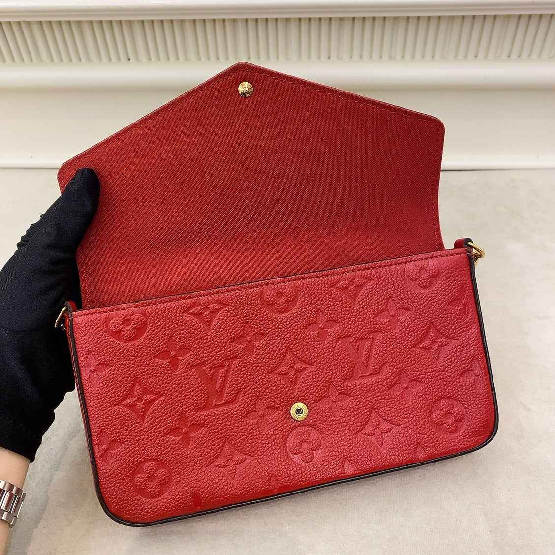 LV Empreinte Felicie Pochette in Red